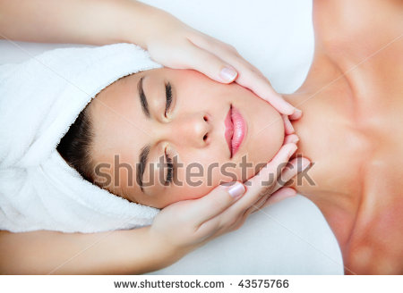 stock-photo-beautiful-young-woman-receiving-facial-massage-43575766_zpsb1884d44